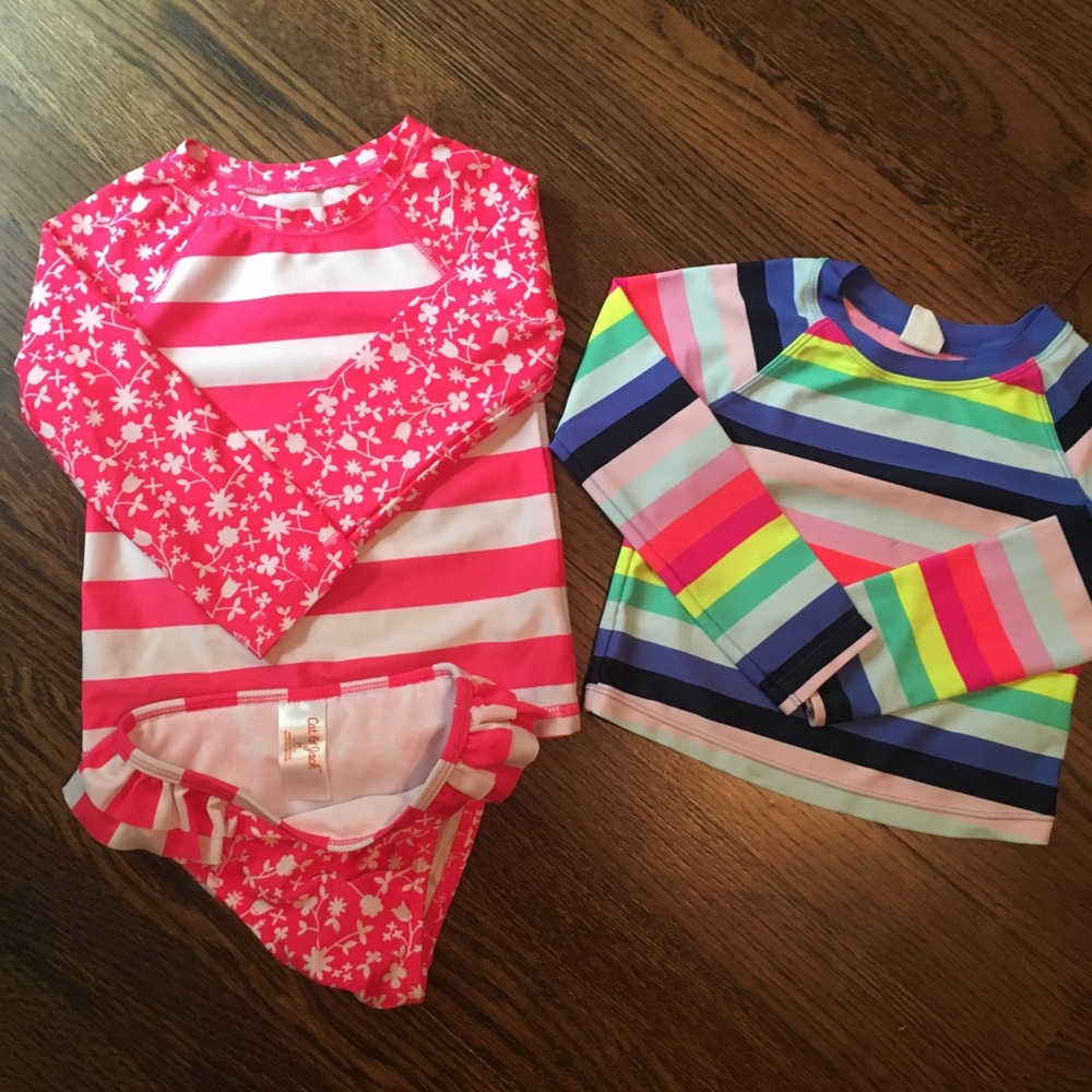 One Cat and Jack Swim Suit and one Gap Rash Guard